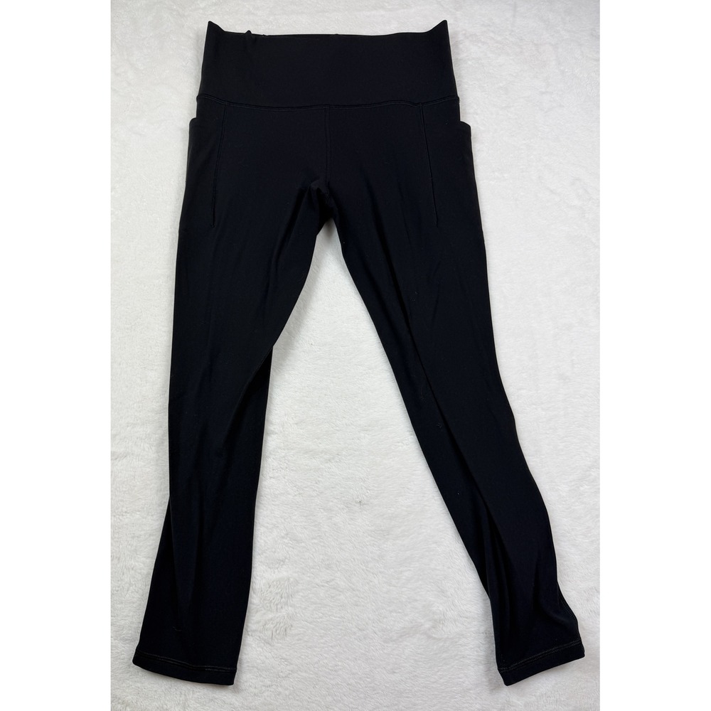 Athleta Salutation Stash 7/8 Tight Black High Rise Leggings Side Pockets Size M